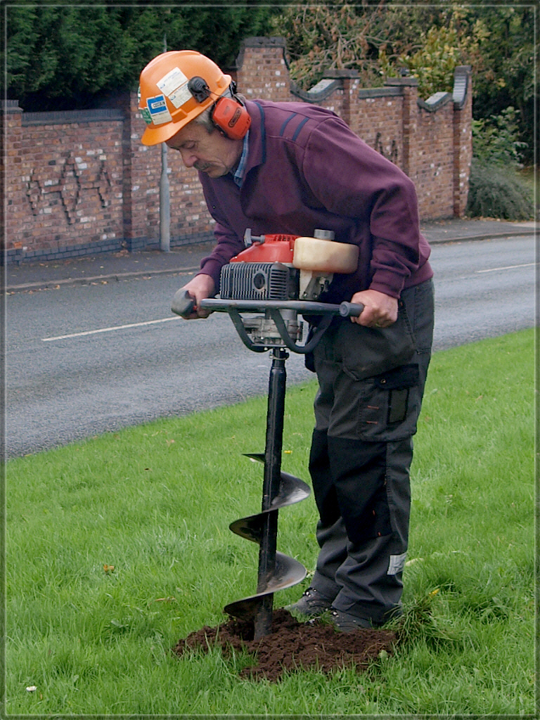 Steve Morris brought an auger and soon got to work with it.